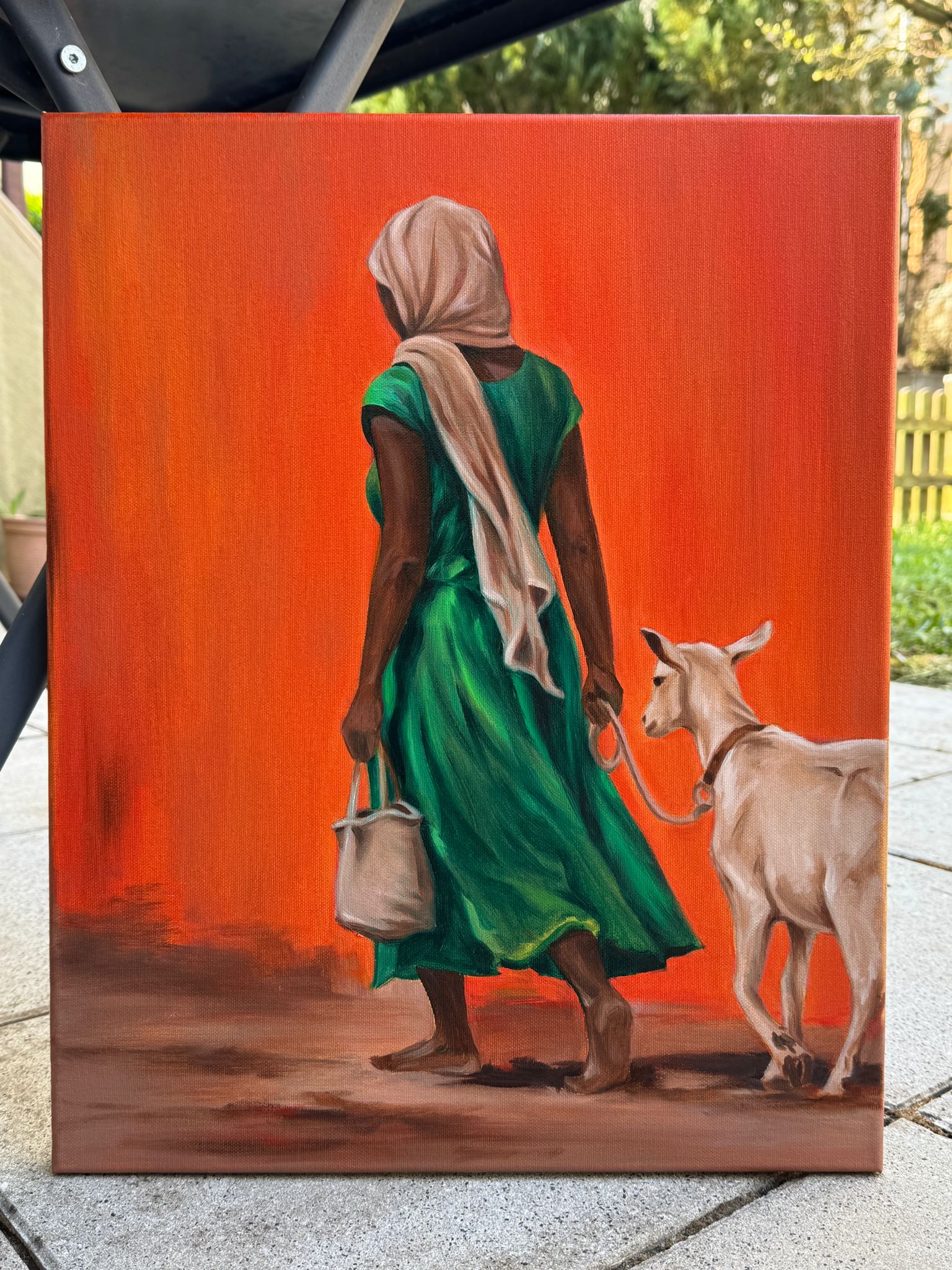 African Woman Walking with Goat - Image 4